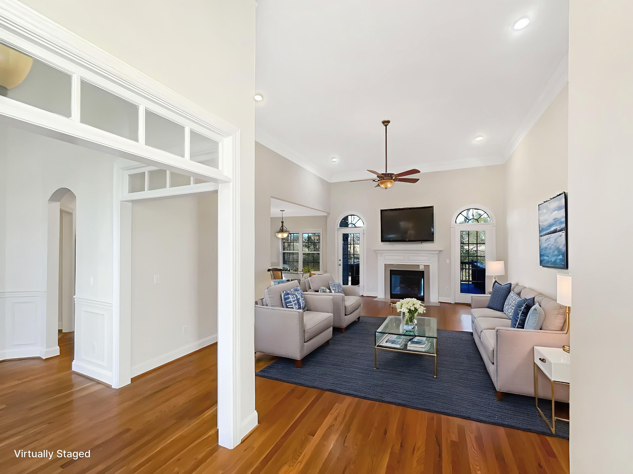 7302 Kempton Court Fairview, TN 37062 - Photo 3 of 28 a living room with fireplace furniture and a wooden floor