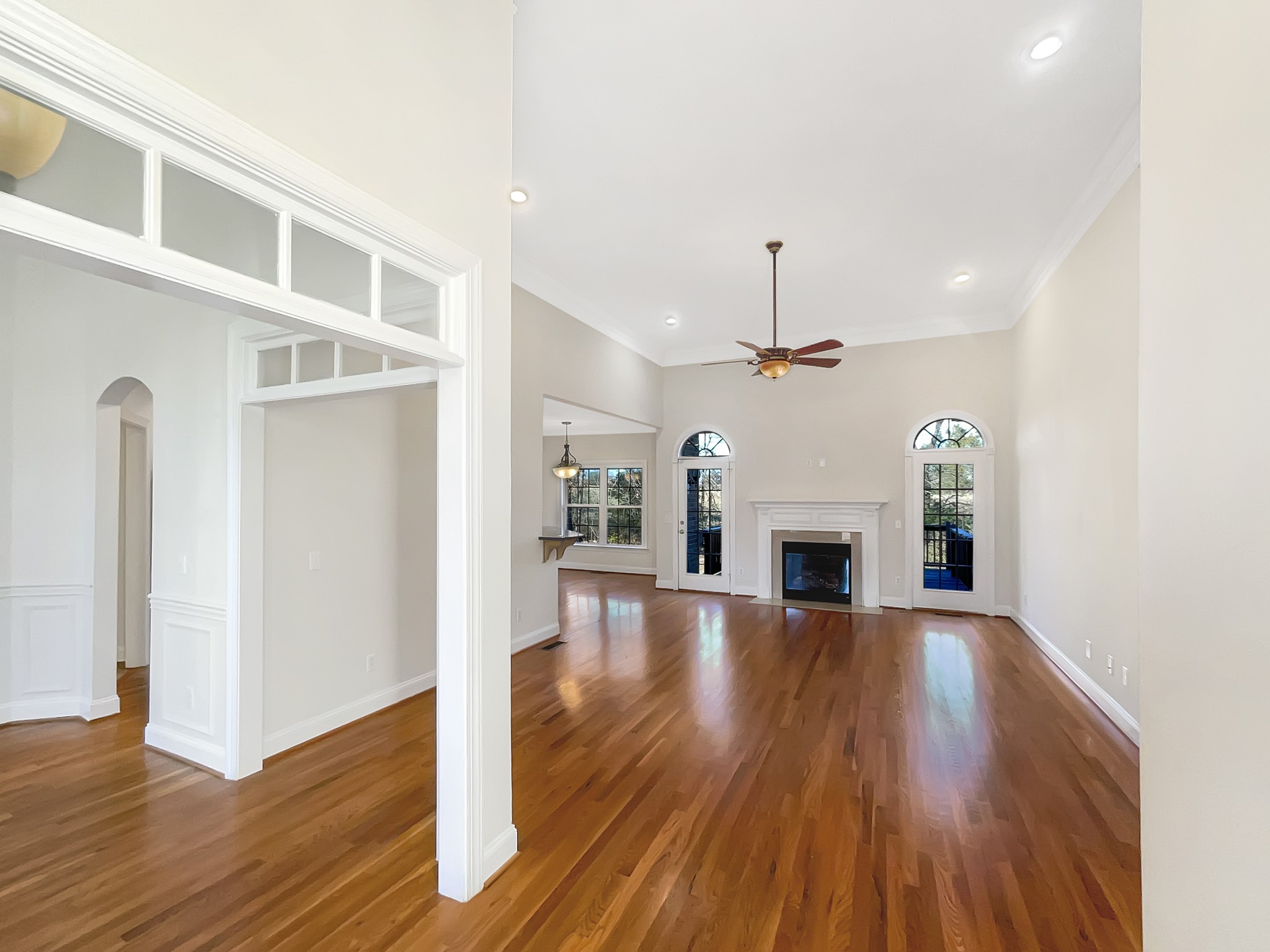 7302 Kempton Court Fairview, TN 37062 - Photo 4 of 28 a view of a livingroom with wooden floor fireplace and window