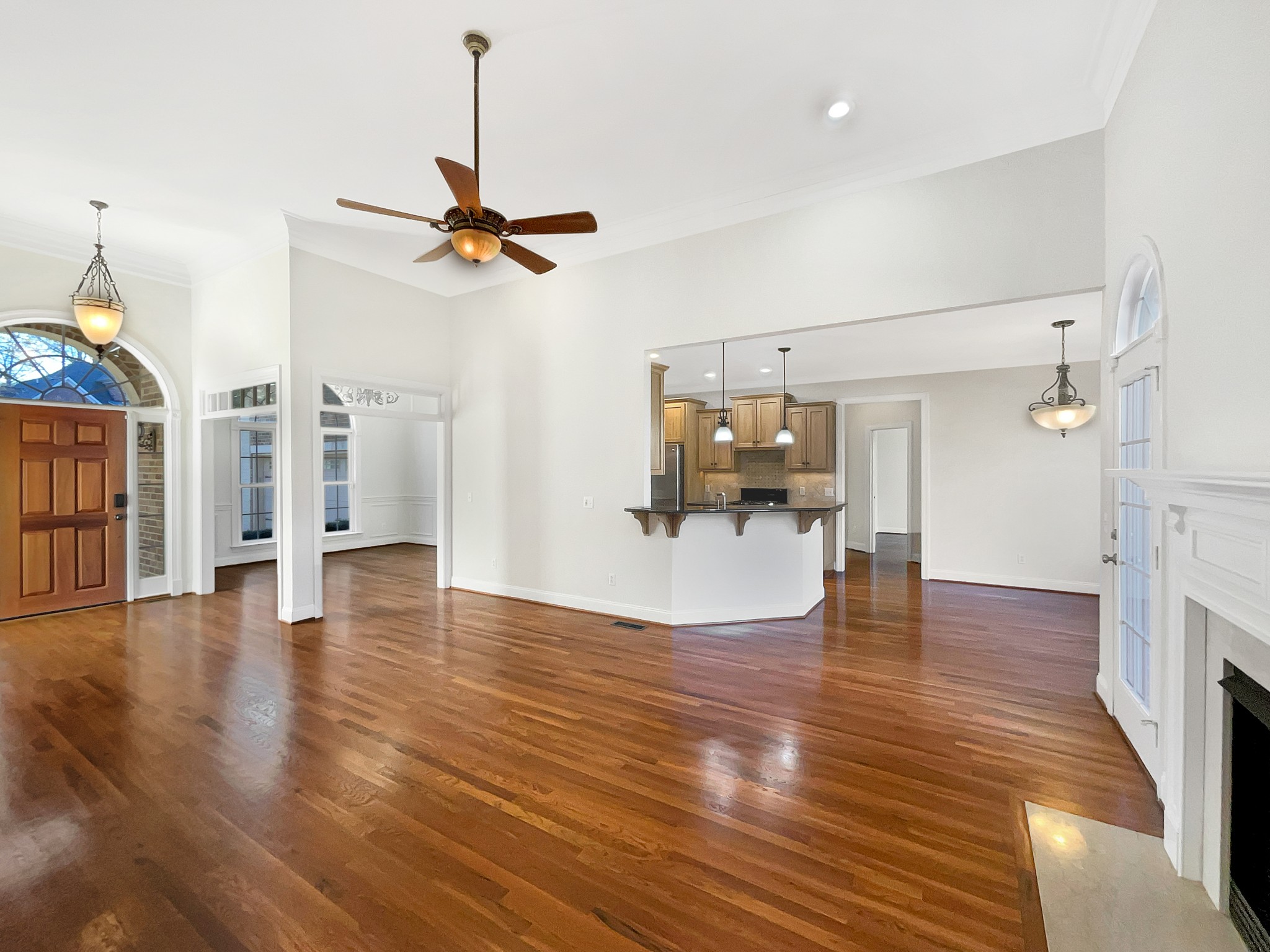 7302 Kempton Court Fairview, TN 37062 - Photo 5 of 28 a view interior of a house wooden floor and a chandelier