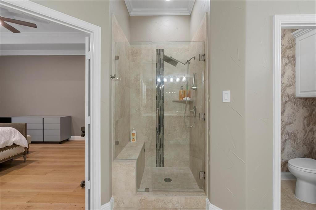 2517 Windsor Castle Way Lewisville, TX 75056 - Photo 13 of 30 a bathroom with a shower and toilet