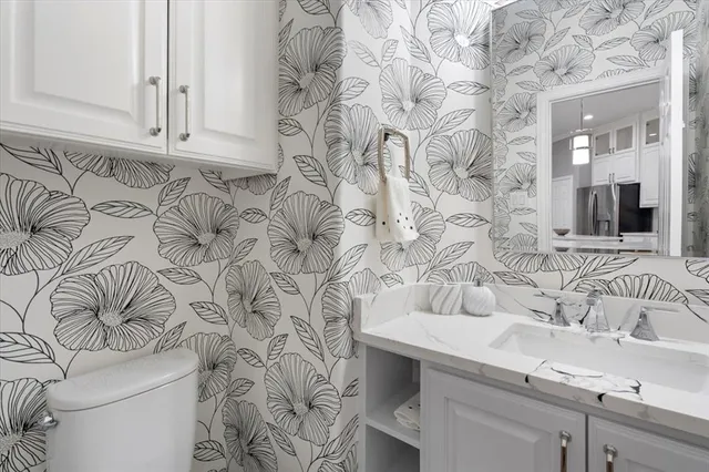 a bathroom with a sink and a toilet