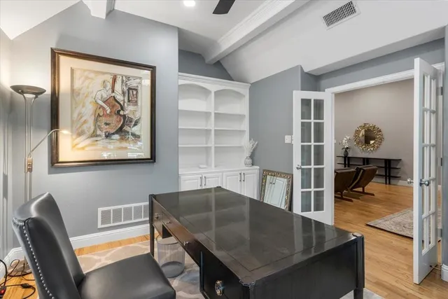 a workspace with furniture and window