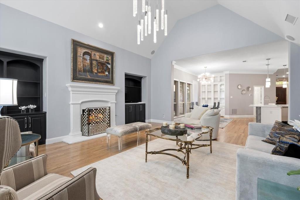 2517 Windsor Castle Way Lewisville, TX 75056 - Photo 9 of 30 a living room with furniture and a fireplace