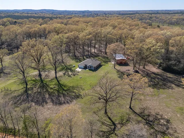 a view of a yard with an outdoor space