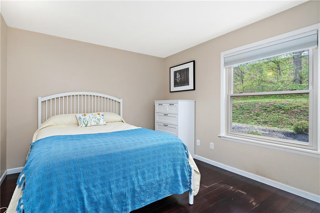 129 Lovi Road Freedom, PA 15042 - Photo 9 of 23 a bedroom with a bed and a window