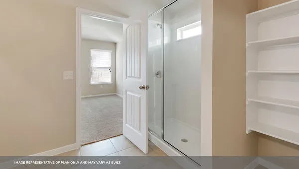 a view of a bathroom with mirror