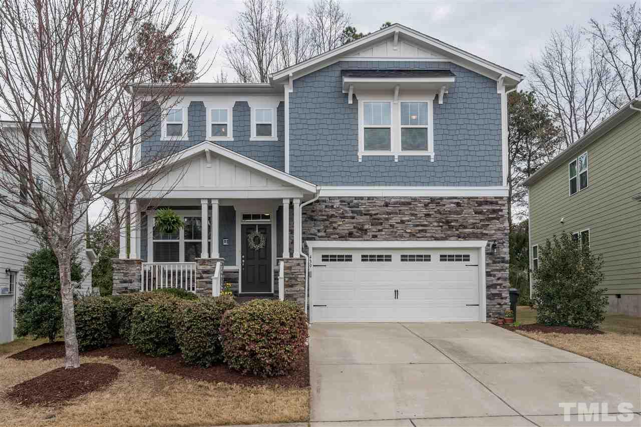439 Plainview Avenue Raleigh, NC 27604 - Photo 1 of 29 a front view of a house with a yard and garage