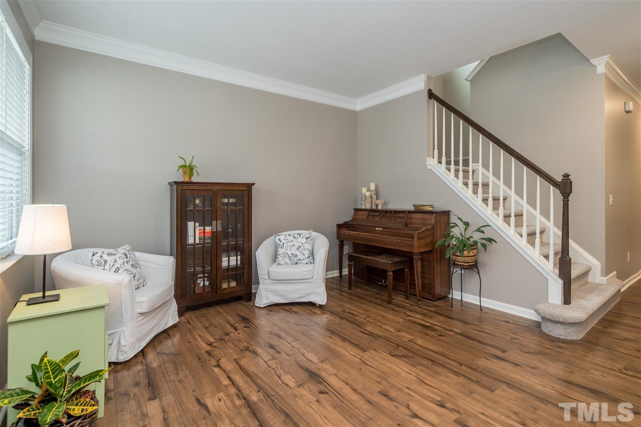 439 Plainview Avenue Raleigh, NC 27604 - Photo 12 of 29 a living room with furniture and a table