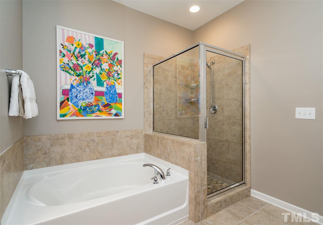 439 Plainview Avenue Raleigh, NC 27604 - Photo 20 of 29 a bathroom with a bathtub and a shower