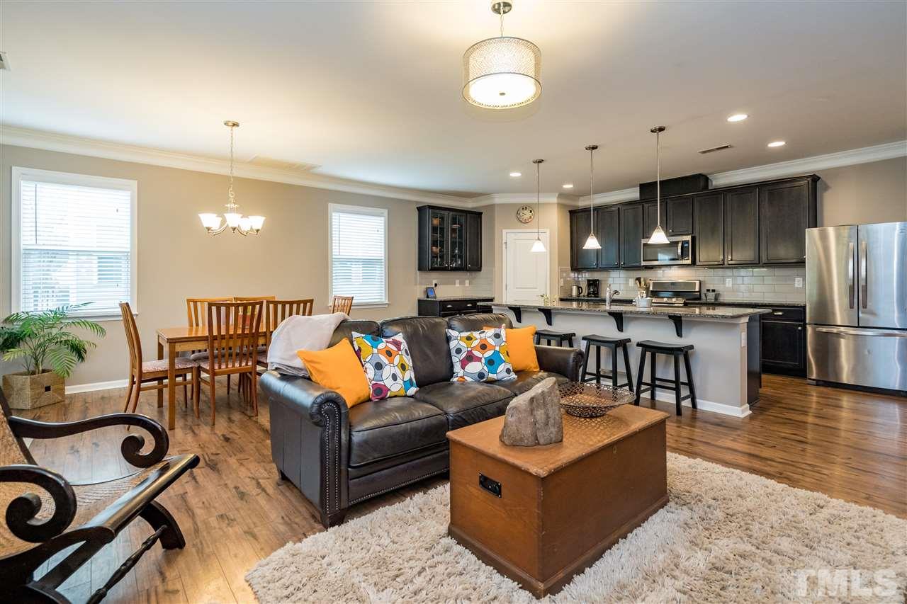 439 Plainview Avenue Raleigh, NC 27604 - Photo 4 of 29 a living room with furniture and kitchen view
