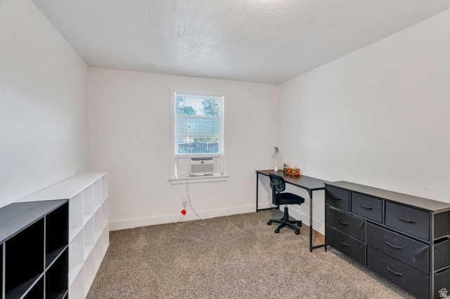 358 400 South Provo, UT 84601 - Photo 6 of 34 Office area with light carpet and a textured ceiling.