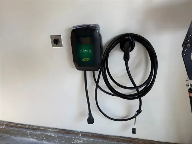 a bathroom with a toilet and a mirror