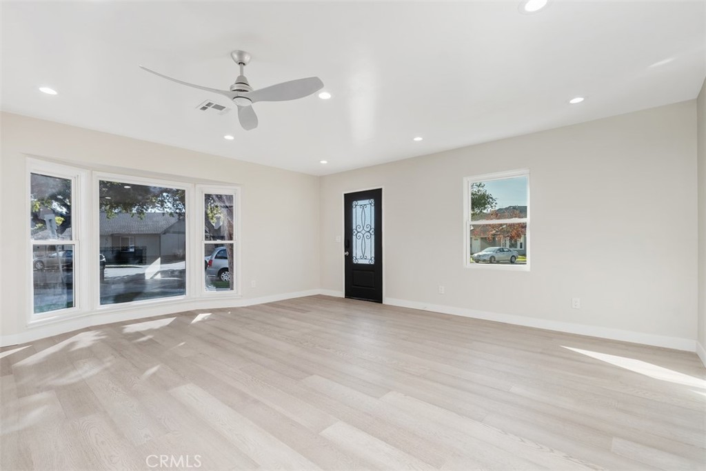 4769 East Malta Street Long Beach, CA 90815 - Photo 5 of 39 a view of an empty room with a window