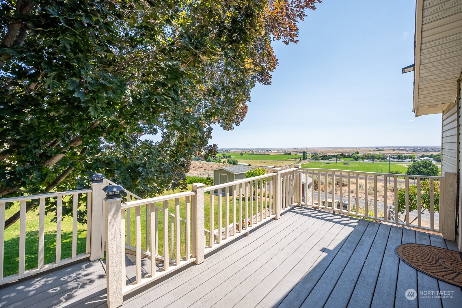 464 Patrick Road Ephrata, WA 98823 - Photo 13 of 30 a view of a balcony with wooden floor