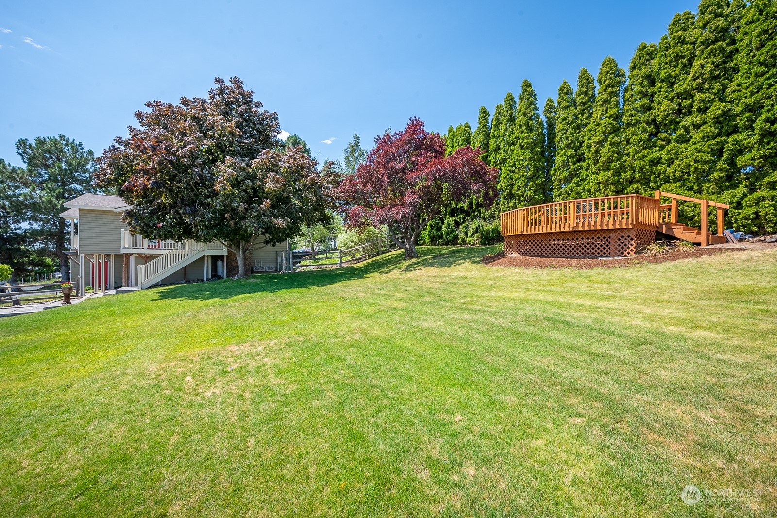 464 Patrick Road Ephrata, WA 98823 - Photo 22 of 30 a view of a house with a yard porch and a tree