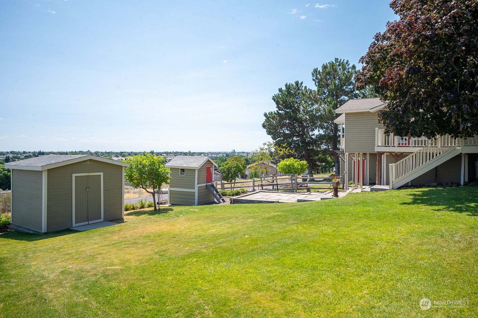 464 Patrick Road Ephrata, WA 98823 - Photo 23 of 30 a view of a house with a yard and sitting area