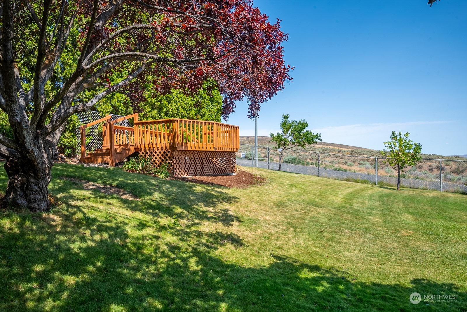464 Patrick Road Ephrata, WA 98823 - Photo 24 of 30 a backyard of a house with lots of green space
