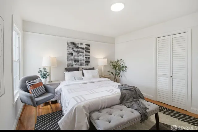 a view of swimming pool with a house in the background