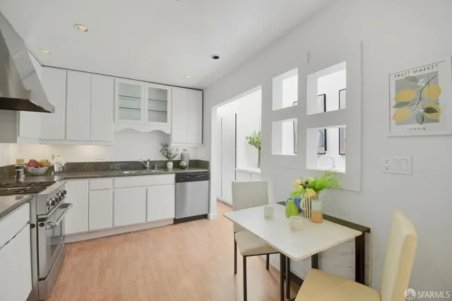 a bathroom with a bathtub sink and toilet