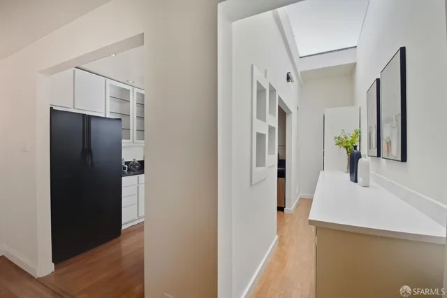 a view of a room with wooden walls