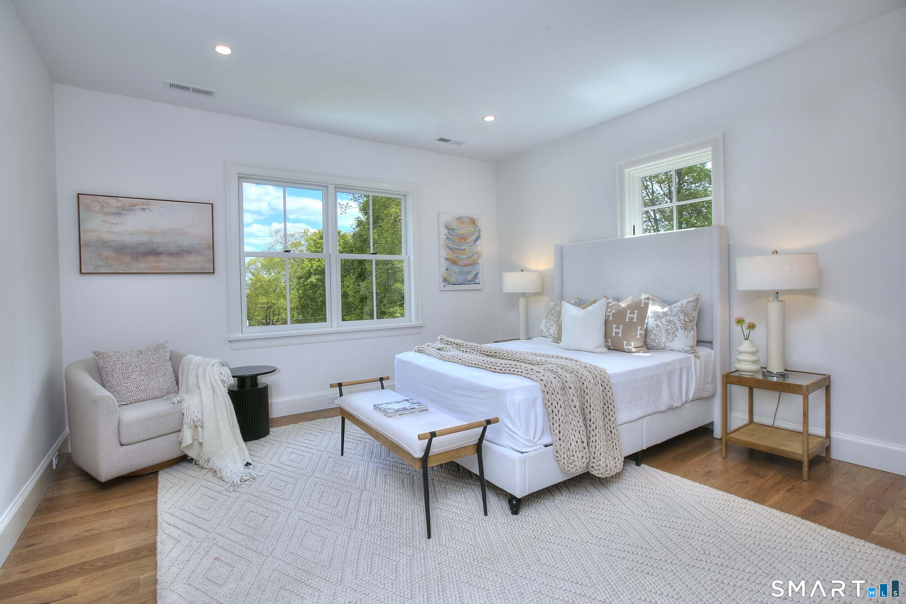48 Kettle Creek Road Weston, CT 06883 - Photo 19 of 40 a bedroom with a bed and a couch