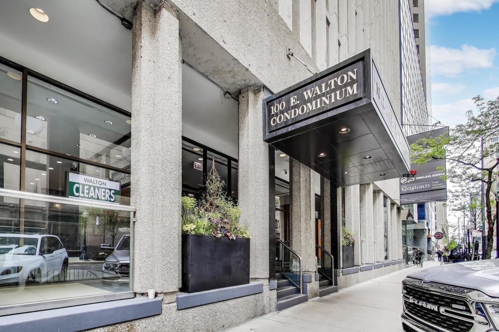 100 East Walton Street, Unit 42F Chicago, IL 60611 - Photo 5 of 52 a view of a street with sitting area