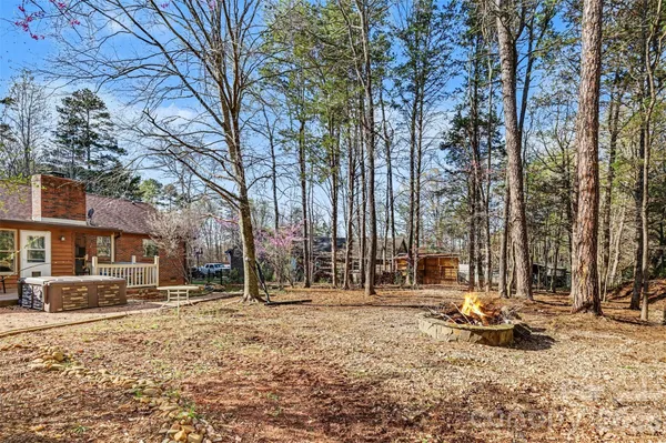 a backyard of a house with lots of green space