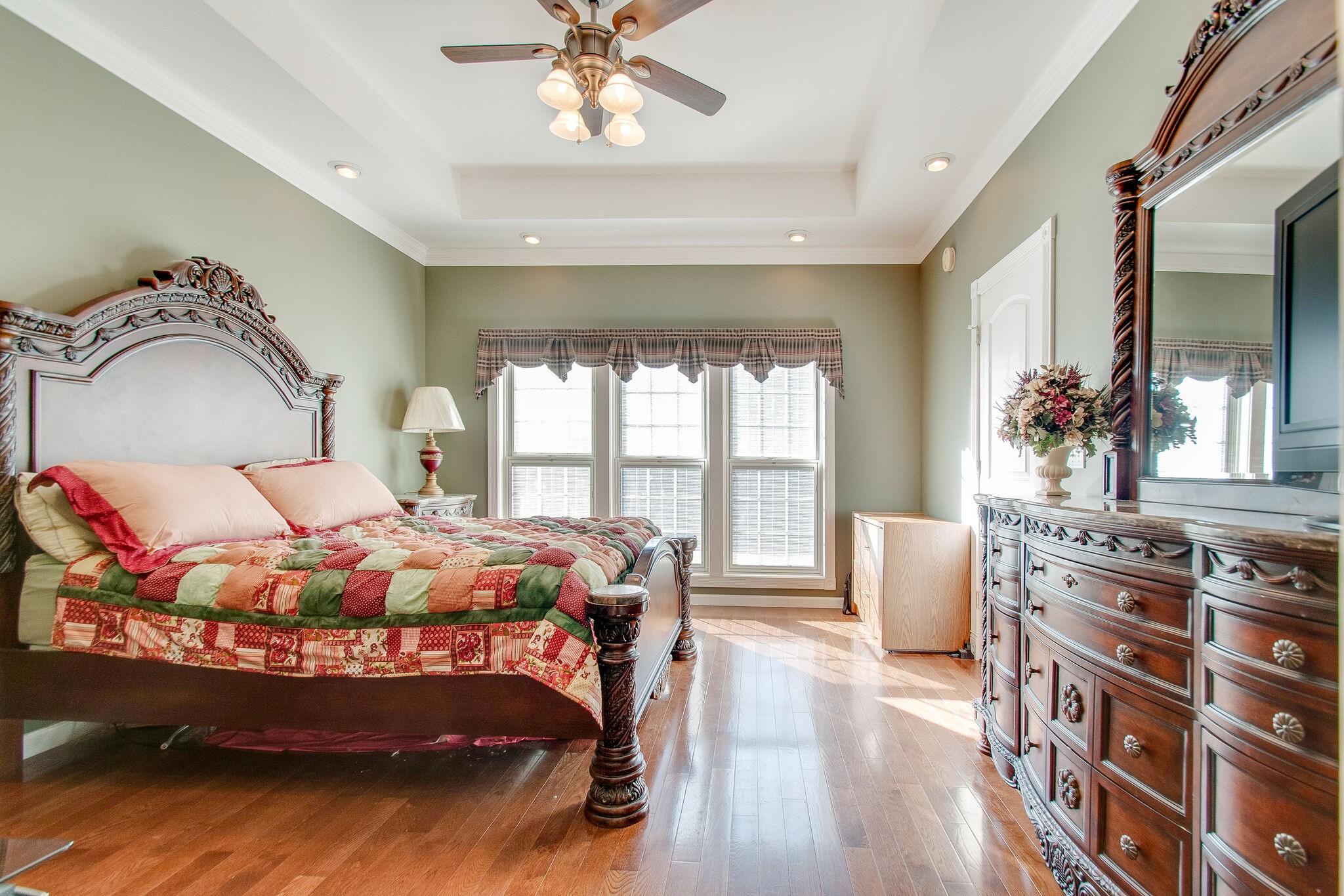 1230 Grindstone Hollow Road Dickson, TN 37055 - Photo 19 of 50 a bedroom with a bed and wooden floor