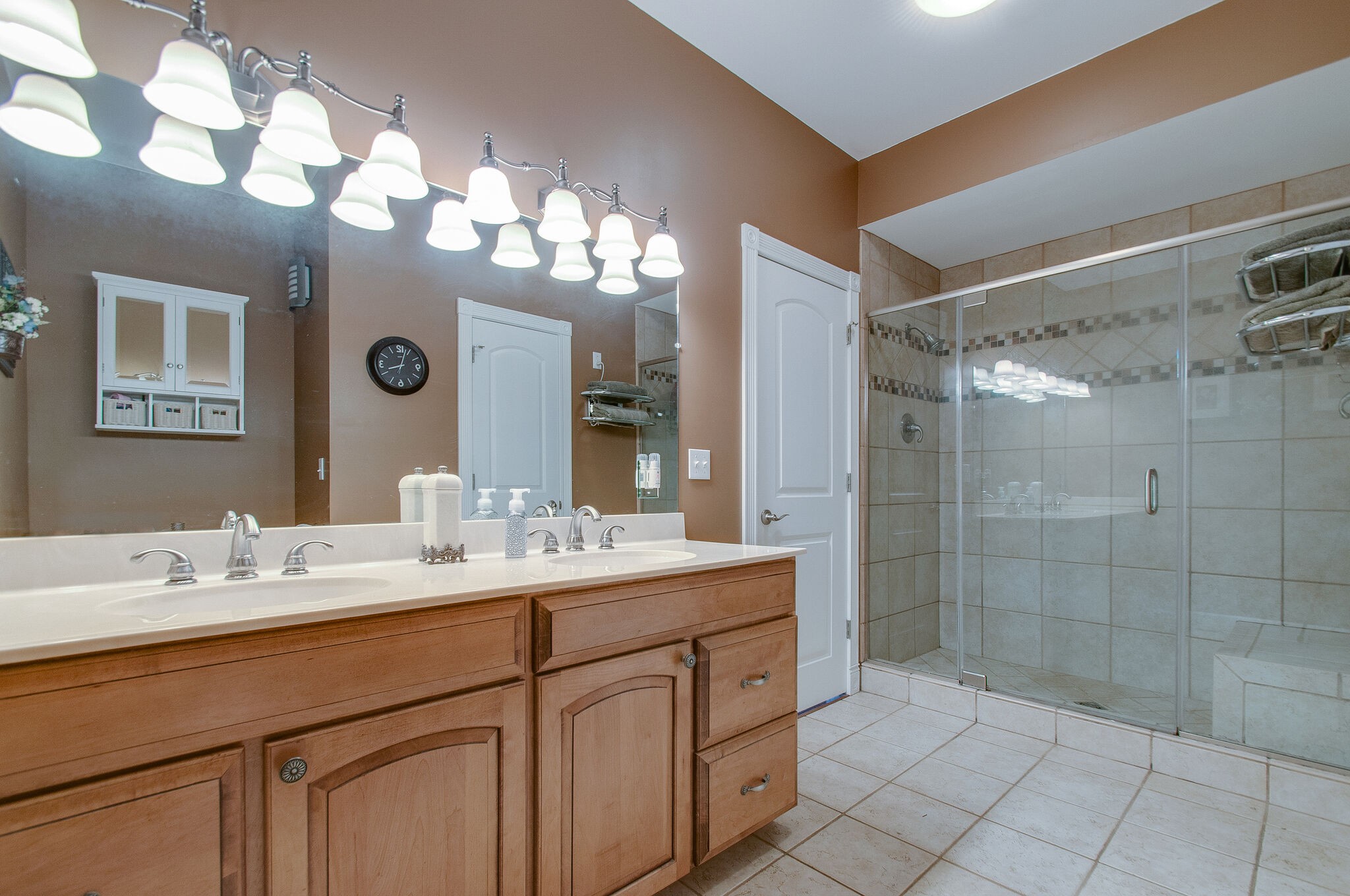 1230 Grindstone Hollow Road Dickson, TN 37055 - Photo 20 of 50 a bathroom with a sink mirror and shower