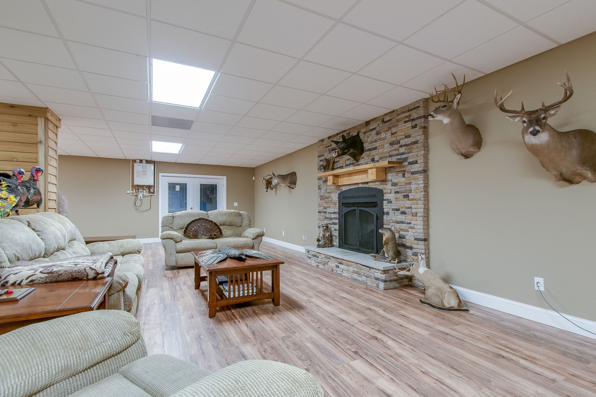 1230 Grindstone Hollow Road Dickson, TN 37055 - Photo 29 of 50 a living room with furniture and a fireplace