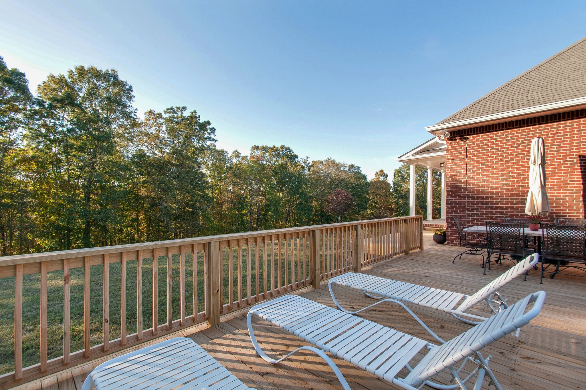 1230 Grindstone Hollow Road Dickson, TN 37055 - Photo 32 of 50 a view of balcony with wooden floor and outdoor seating