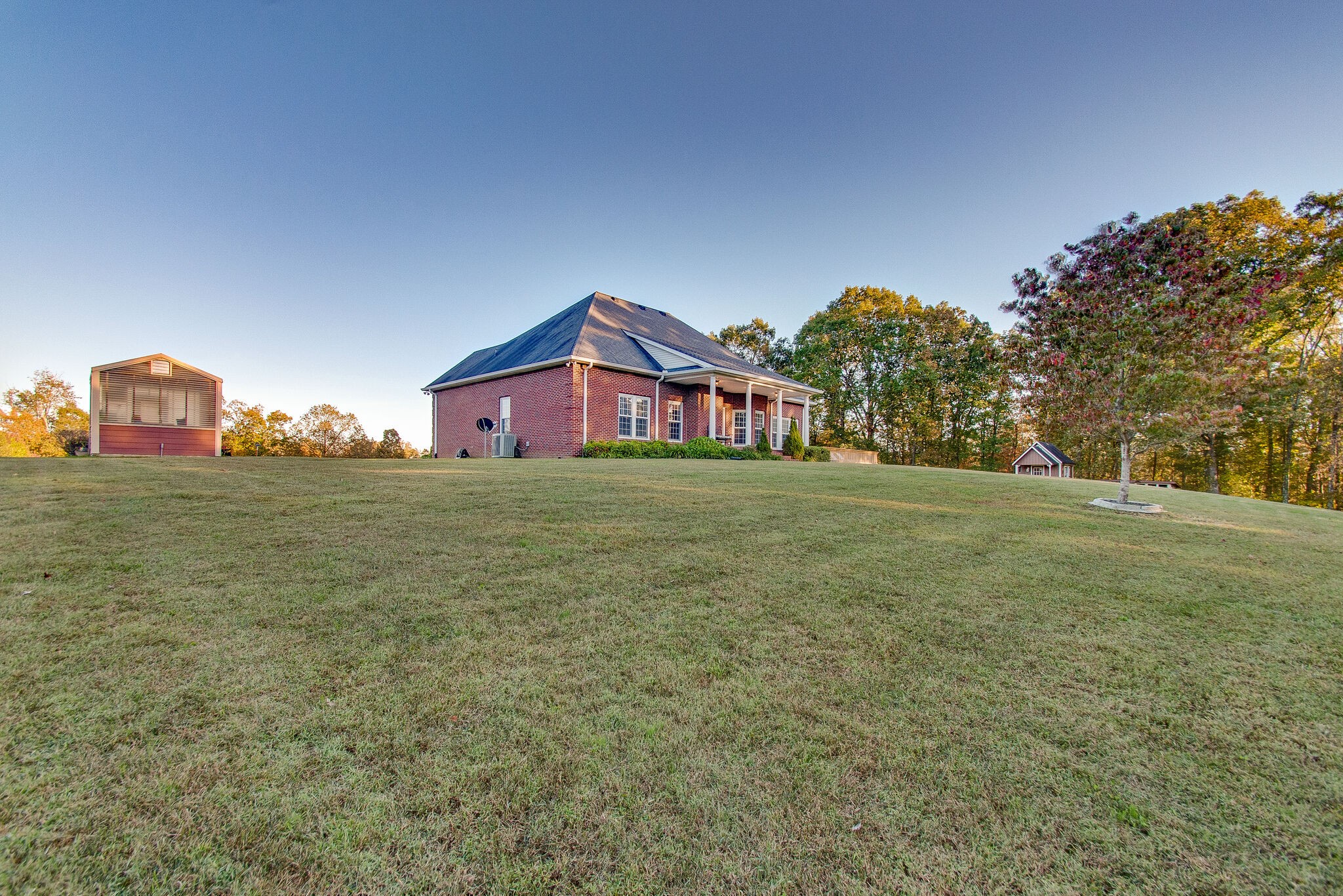 1230 Grindstone Hollow Road Dickson, TN 37055 - Photo 36 of 50 a view of a house with a big yard