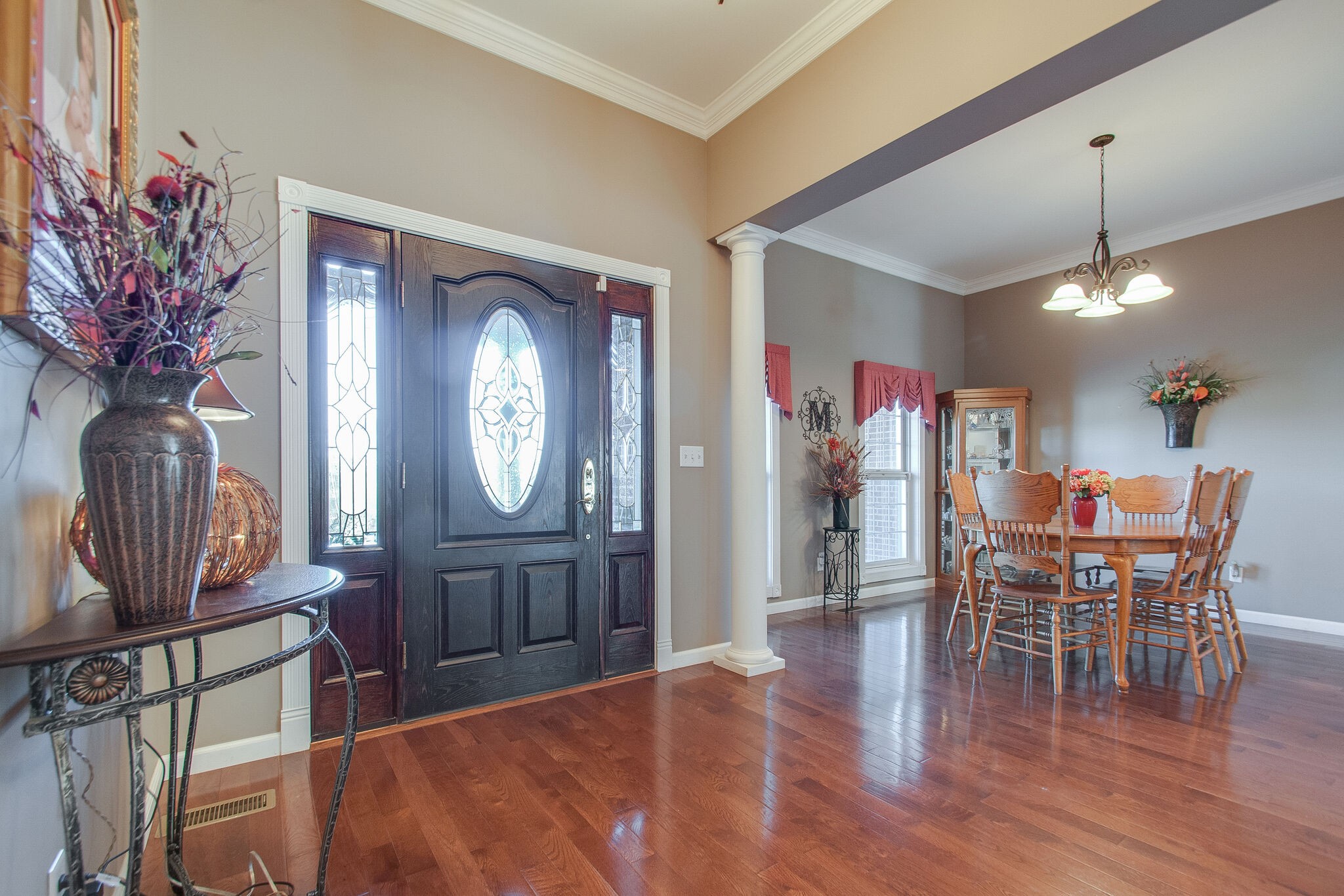 1230 Grindstone Hollow Road Dickson, TN 37055 - Photo 5 of 50 a view of a dining room with furniture and wooden floor
