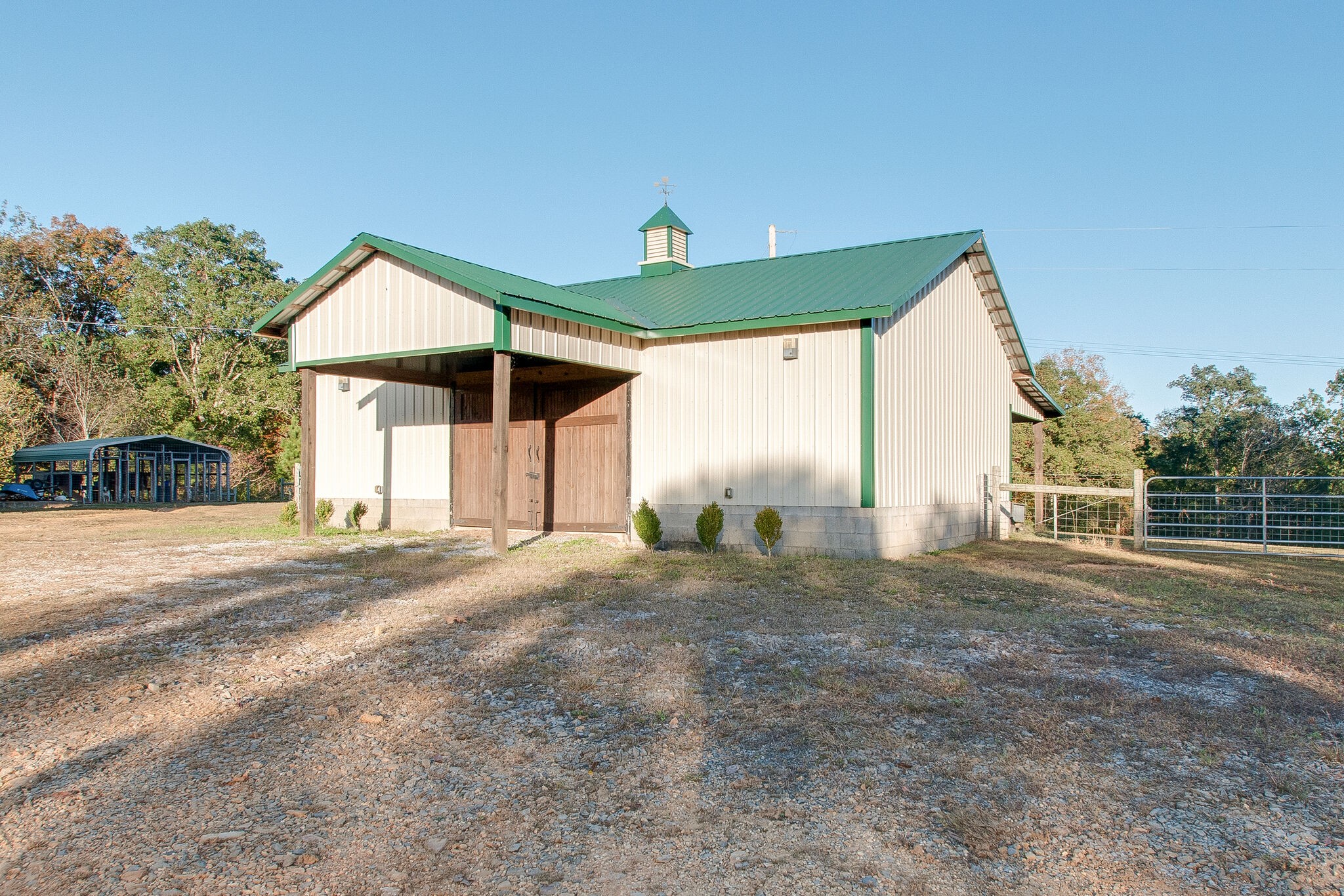 1230 Grindstone Hollow Road Dickson, TN 37055 - Photo 49 of 50 a view of a house with a yard and garage