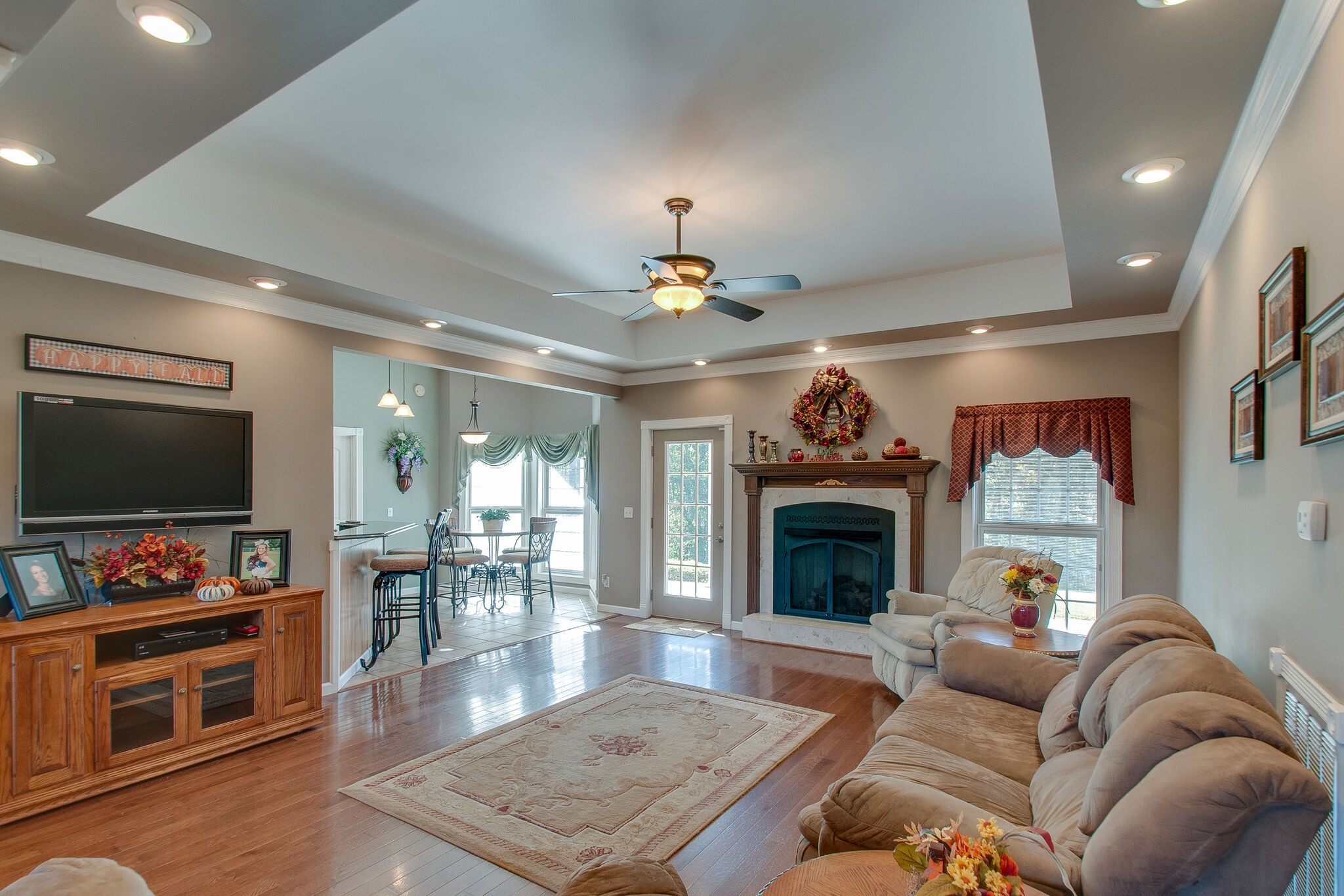 1230 Grindstone Hollow Road Dickson, TN 37055 - Photo 7 of 50 a living room with furniture and a fireplace