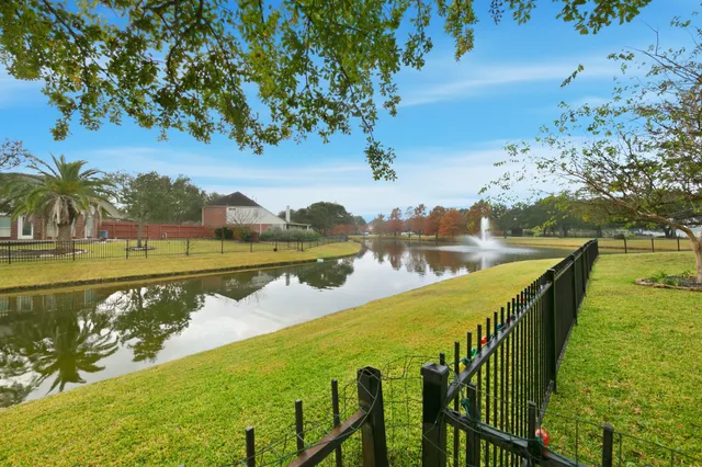a view of a lake with a garden