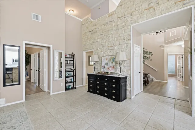 a spacious bathroom with a vanity and a shower