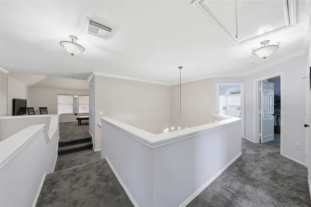 a white bath tub sitting in a en suite bathroom