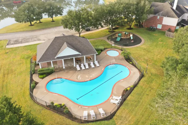 a view of swimming pool with a garden