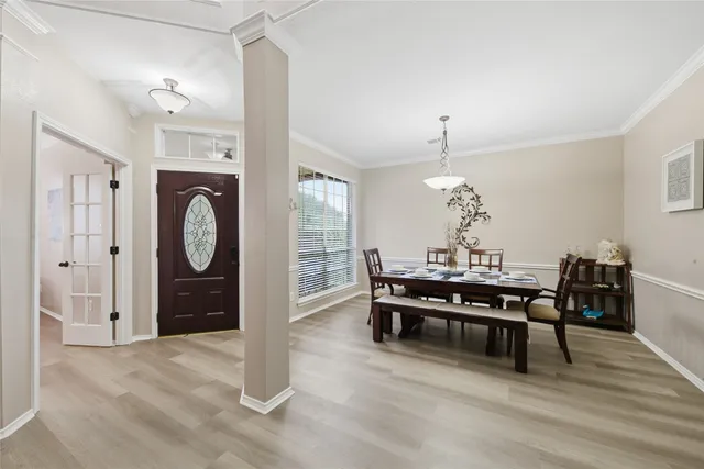 a view of a livingroom with furniture and wooden floor