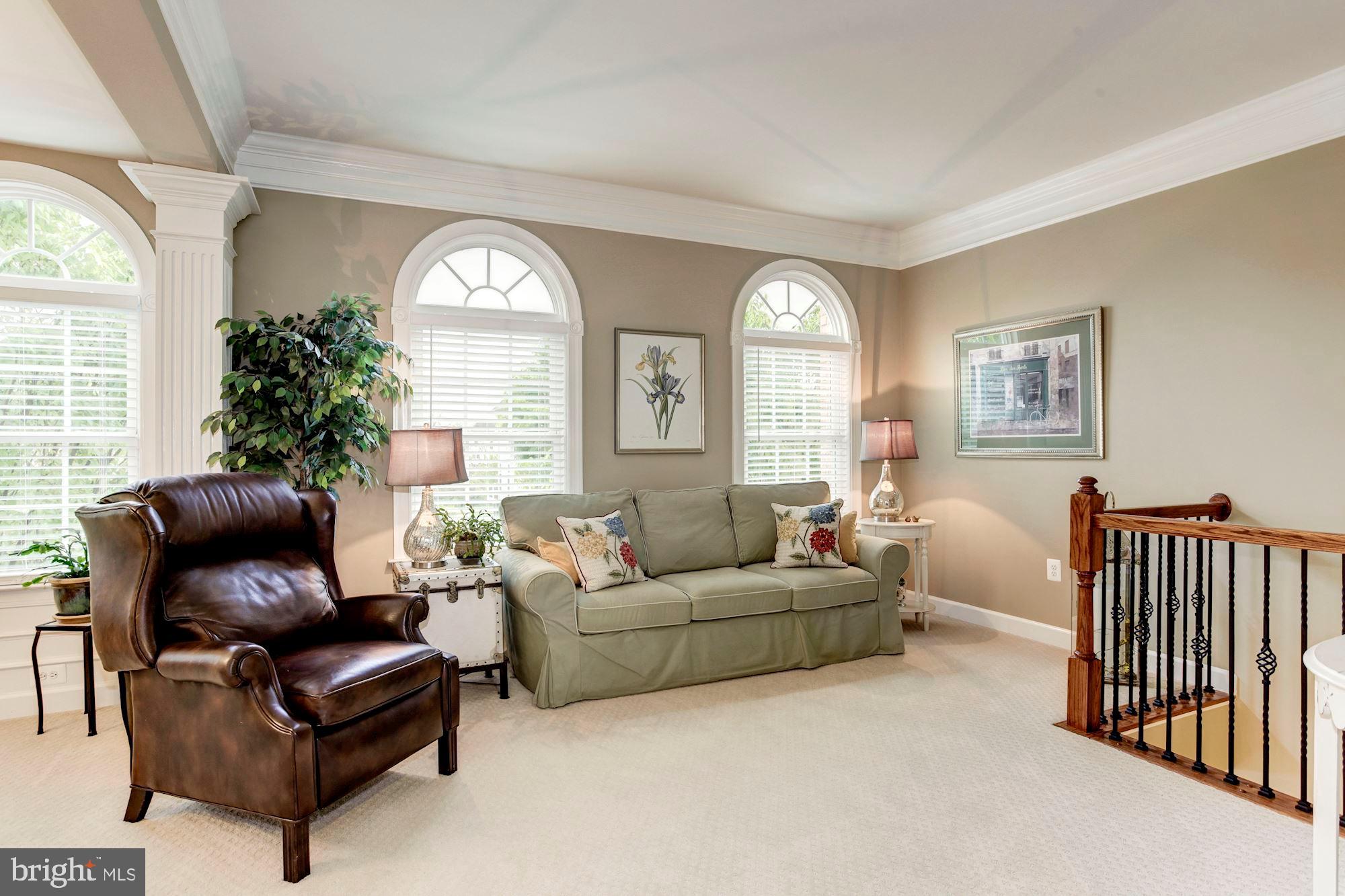 24960 Castleton Drive Chantilly, VA 20152 - Photo 13 of 44 a living room with furniture and a large window