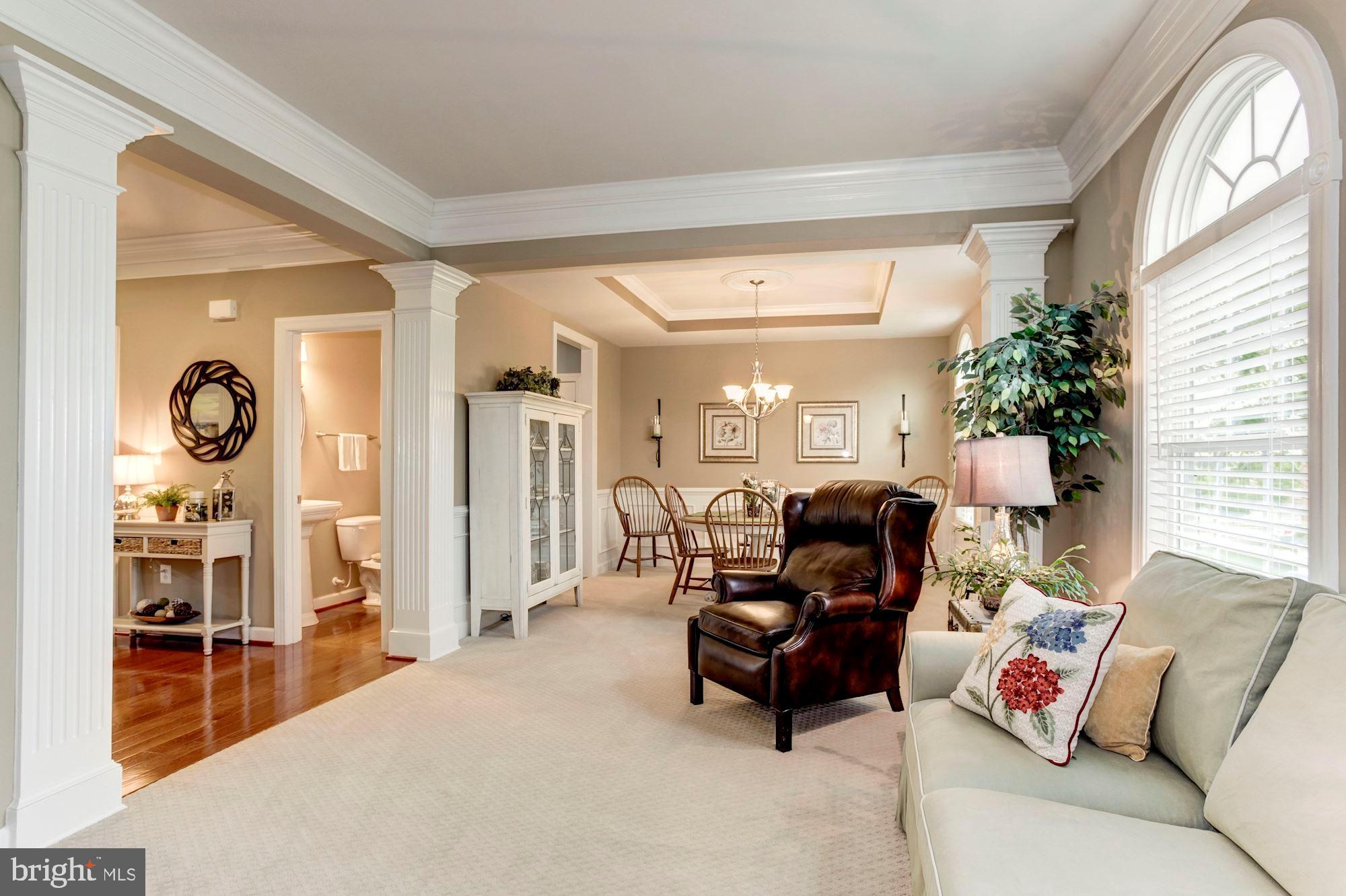 24960 Castleton Drive Chantilly, VA 20152 - Photo 14 of 44 a living room with furniture and a large window