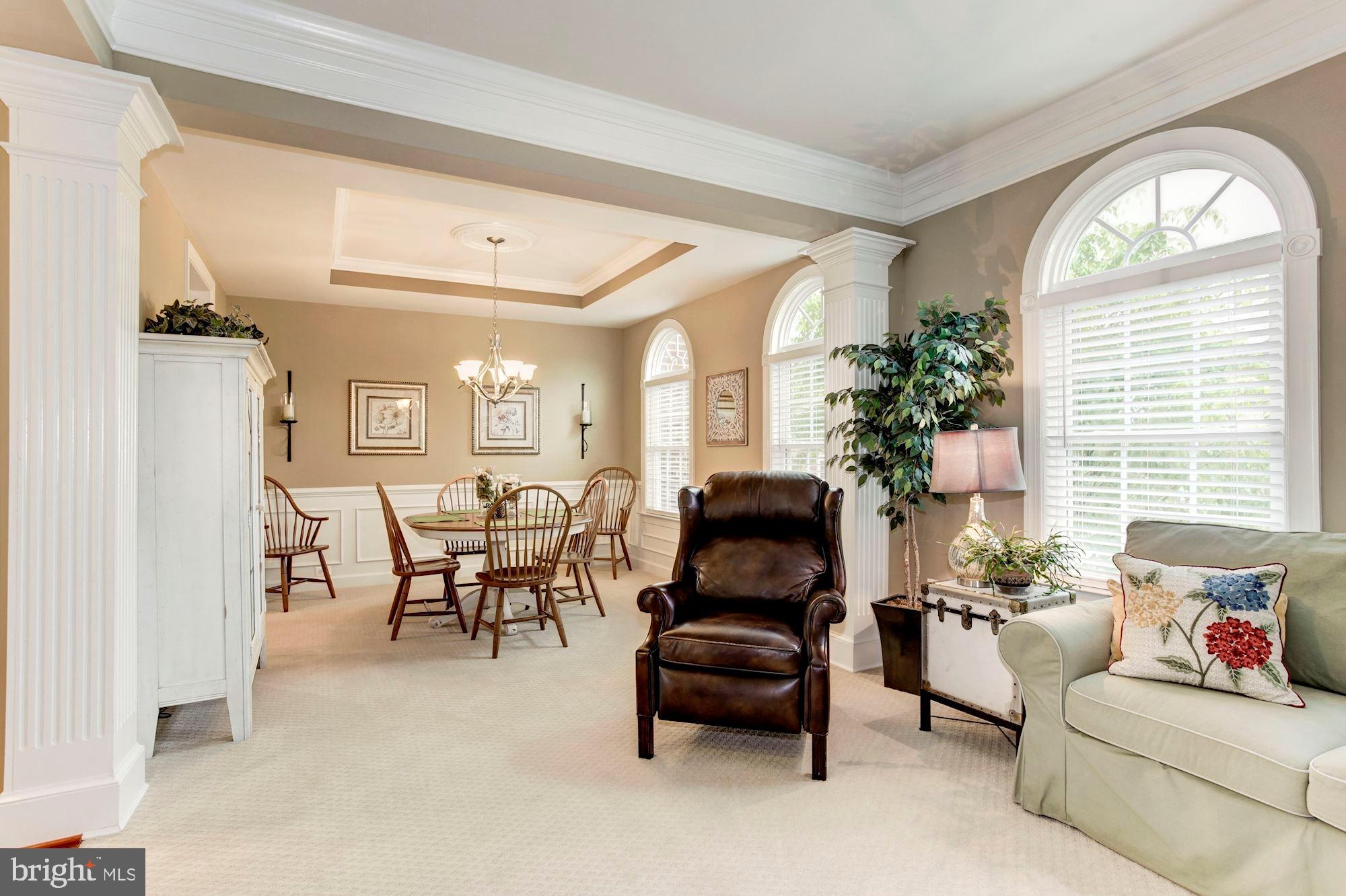 24960 Castleton Drive Chantilly, VA 20152 - Photo 15 of 44 a living room with furniture and a large window