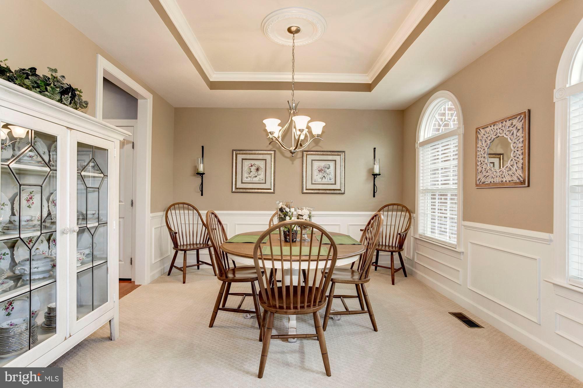 24960 Castleton Drive Chantilly, VA 20152 - Photo 20 of 44 a view of a dining room with furniture window and wooden floor