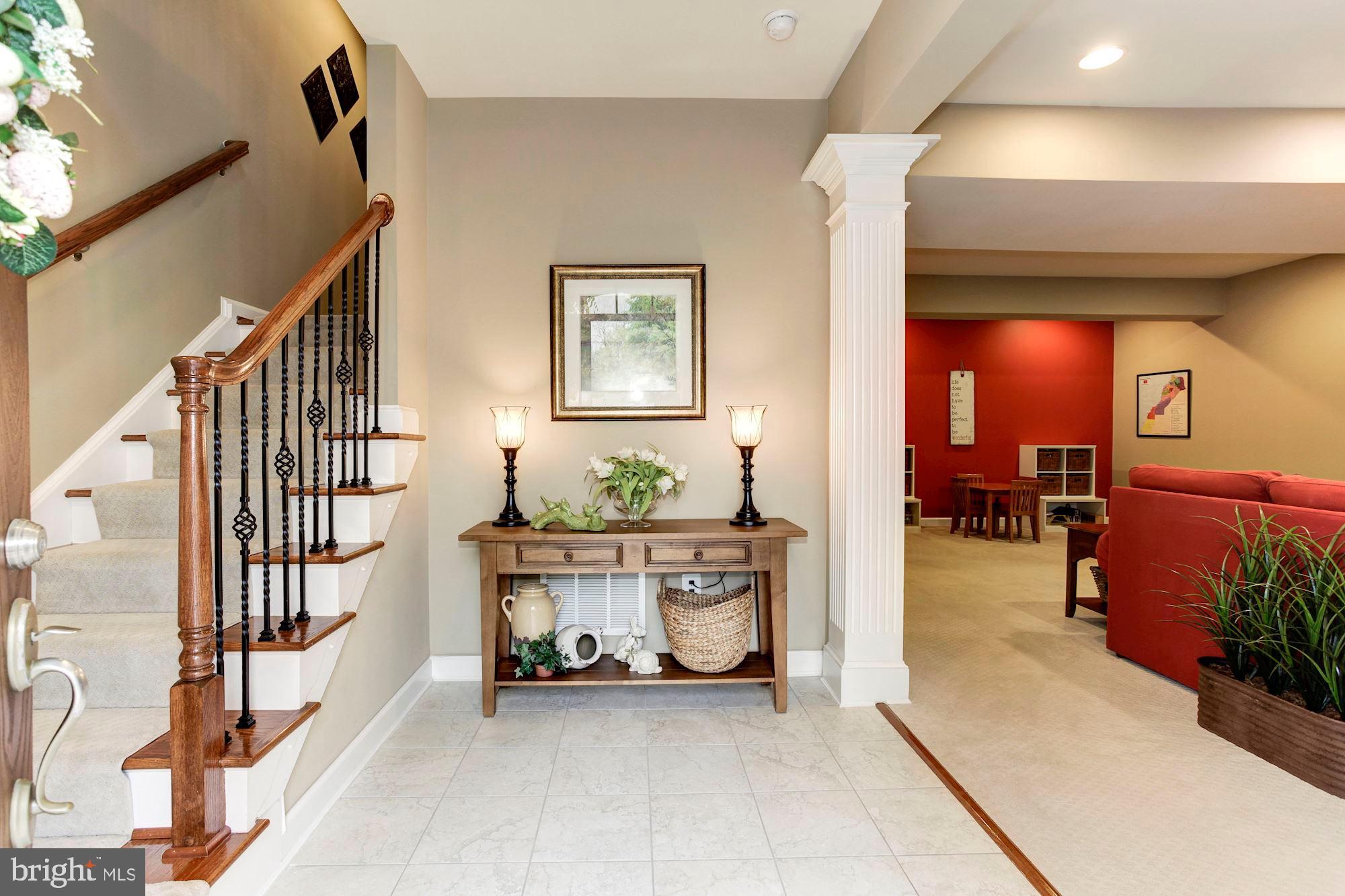 24960 Castleton Drive Chantilly, VA 20152 - Photo 2 of 44 a view of an entryway with a workspace