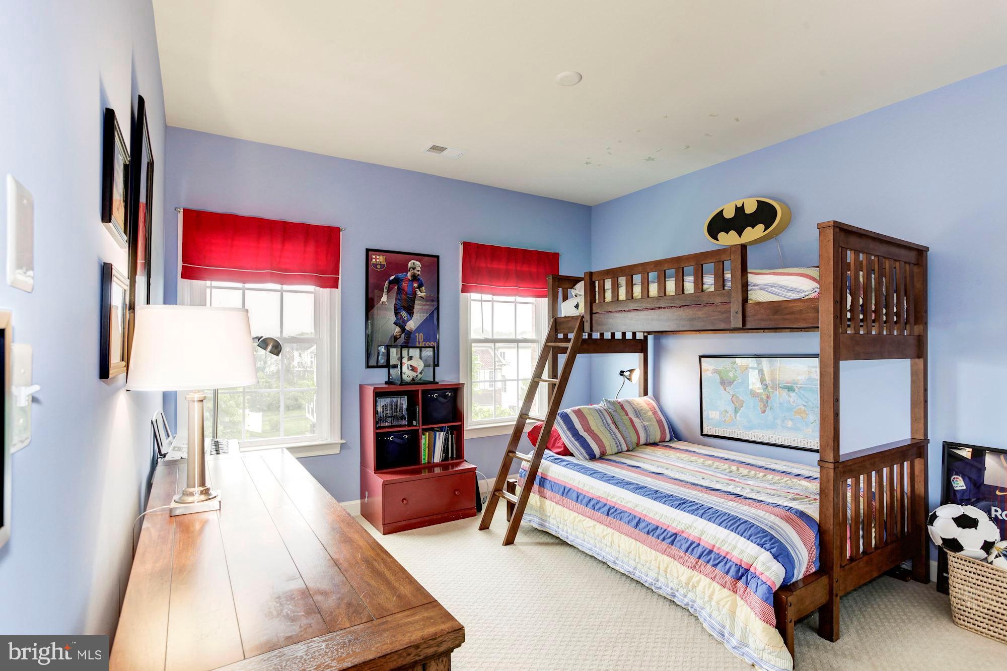 24960 Castleton Drive Chantilly, VA 20152 - Photo 33 of 44 a bedroom with furniture and a flat screen tv