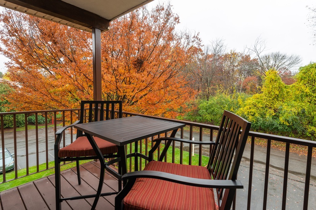 189 Littleton Road, Unit 19 Chelmsford, MA 01824 - Photo 17 of 42 a view of a balcony with furniture