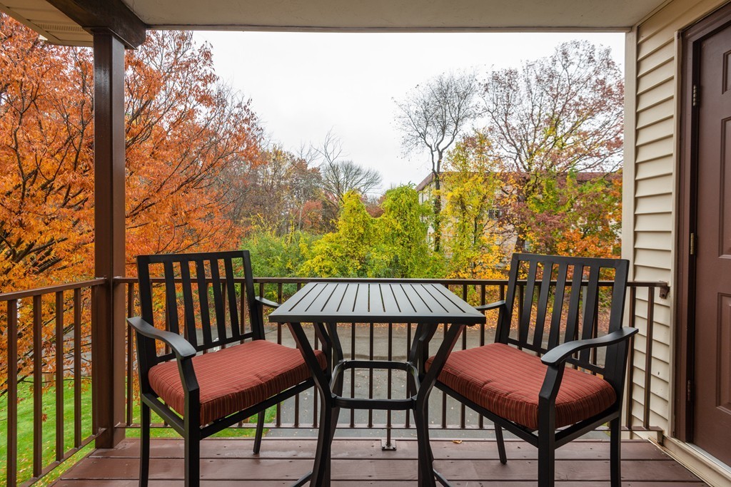 189 Littleton Road, Unit 19 Chelmsford, MA 01824 - Photo 19 of 42 a view of a chairs in balcony