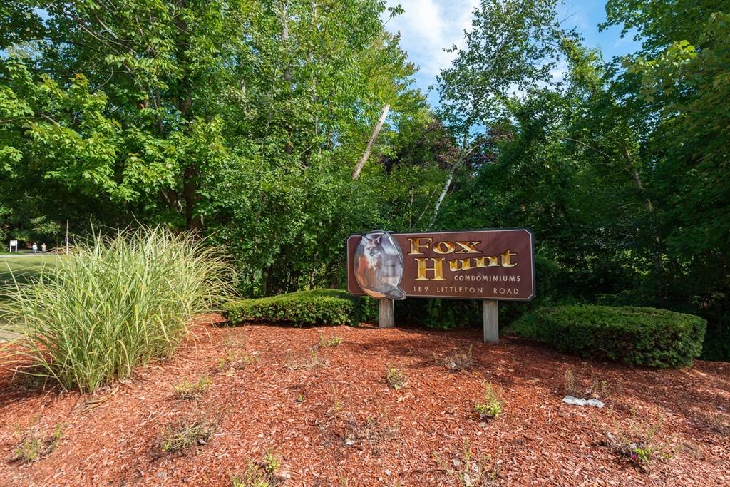 189 Littleton Road, Unit 19 Chelmsford, MA 01824 - Photo 42 of 42 a sign that is sitting in the middle of a park