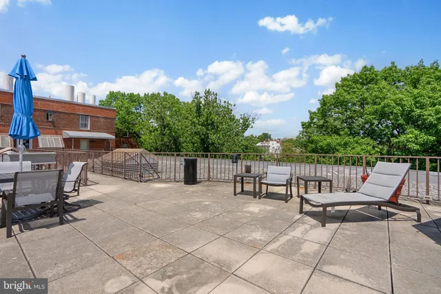 a view of a terrace with furniture